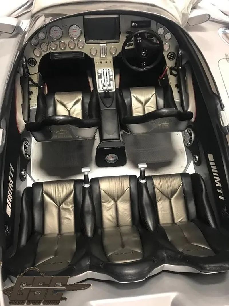 Slide: The Image of 2007 MTI 44 AMG TRIBUTE boat interior with leather seats and modern dashboard. - 39