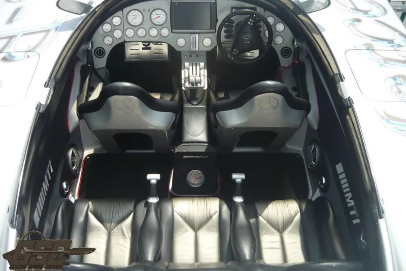 Slide: The Image of 2007 MTI 44 AMG TRIBUTE boat interior with leather seats and advanced dashboard. - 40