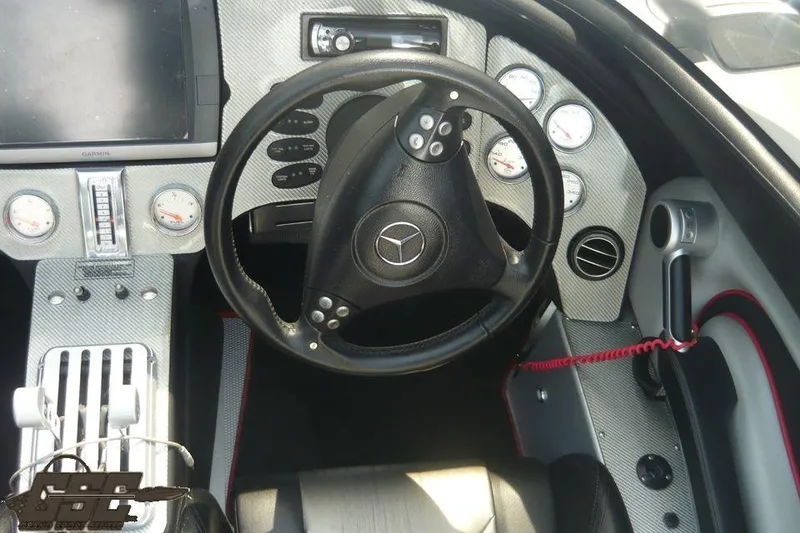 Slide: The Image of 2007 MTI 44 AMG TRIBUTE dashboard with steering wheel and gauges. - 41