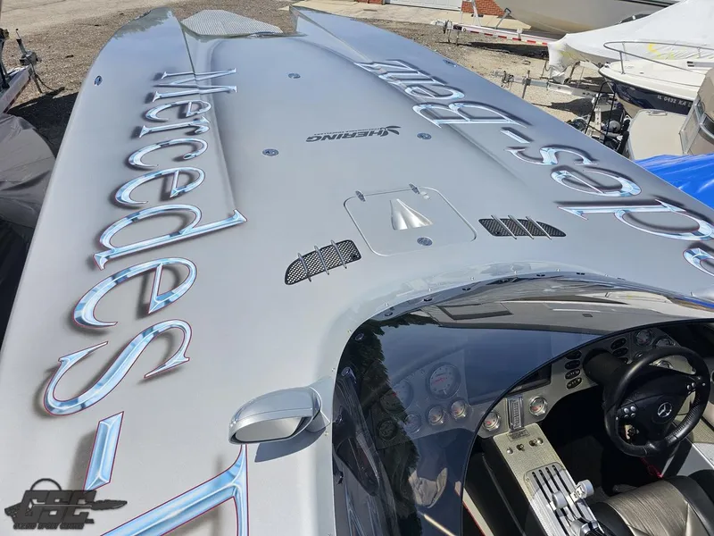 Slide: The Image of 2007 MTI 44 AMG TRIBUTE speedboat with Mercedes-Benz branding, interior view. - 48