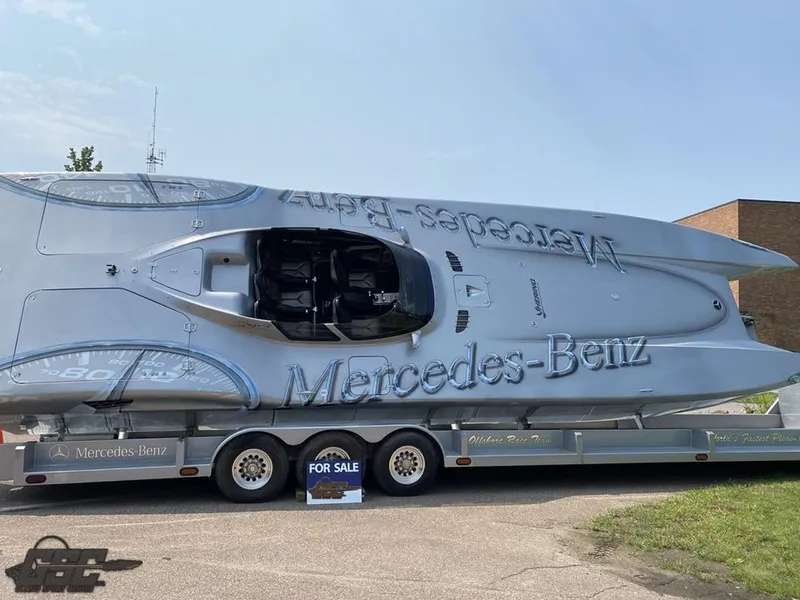 Slide: The Image of 2007 MTI 44 AMG TRIBUTE powerboat on trailer, Mercedes-Benz branding, For Sale sign. - 5