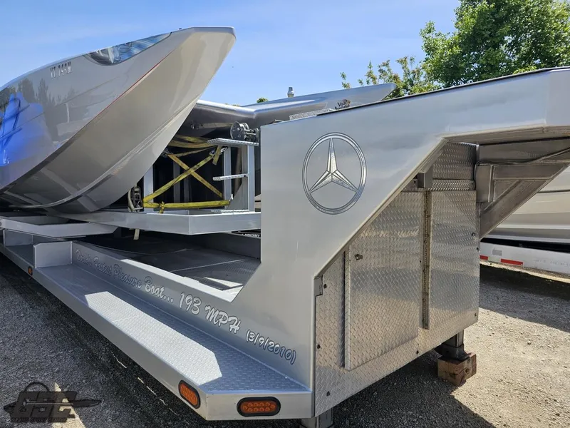 Slide: The Image of 2007 MTI 44 AMG TRIBUTE boat on a custom trailer with Mercedes-Benz logo. - 6