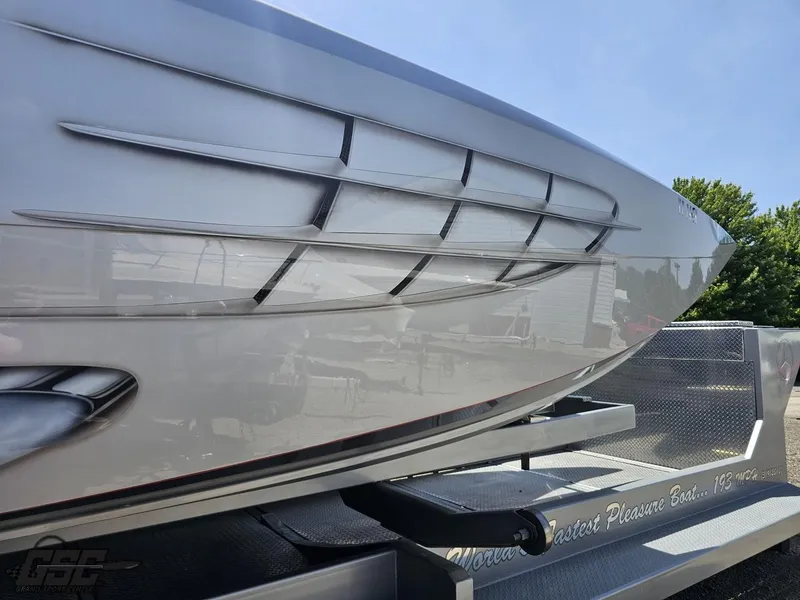 Slide: The Image of Close-up of a 2007 MTI 44 AMG TRIBUTE boat on a trailer. - 9