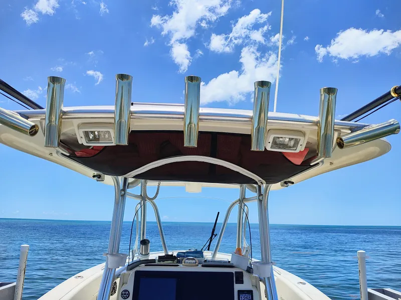 Slide: The Image of 2008 Hydra-Sports Vector 2900 CC boat on open water under clear blue sky. - 19