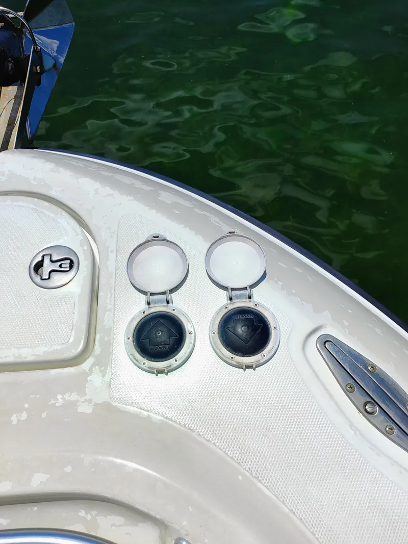 Slide: The Image of 2008 Hydra-Sports Vector 2900 CC boat deck with open hatches and water background. - 22