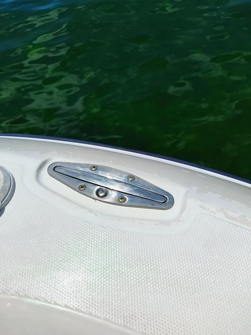 Slide: The Image of 2008 Hydra-Sports Vector 2900 CC boat detail with water background. - 24