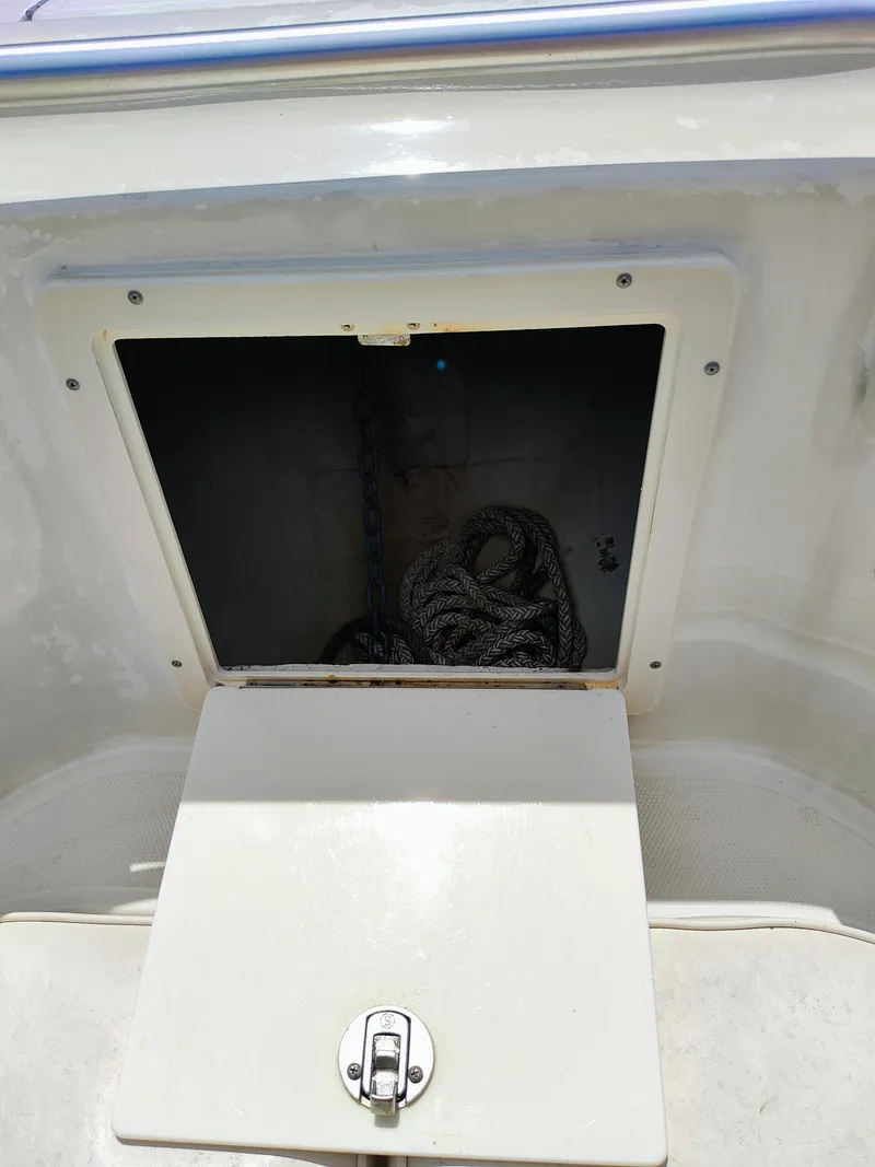 Slide: The Image of Open storage compartment on a 2008 Hydra-Sports Vector 2900 CC boat. - 25