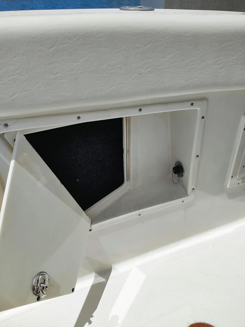 Slide: The Image of Open storage compartment on a 2008 Hydra-Sports Vector 2900 CC boat. - 33