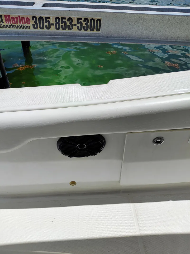 Slide: The Image of 2008 Hydra-Sports Vector 2900 CC boat interior detail with speaker and water background. - 47