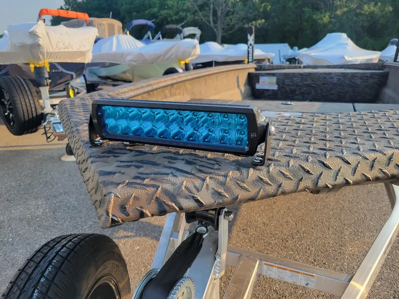 Slide: The Image of 2025 Xpress XTS16 duck hunting boat with Yamaha 25 hp, featuring a blue LED light. - 3