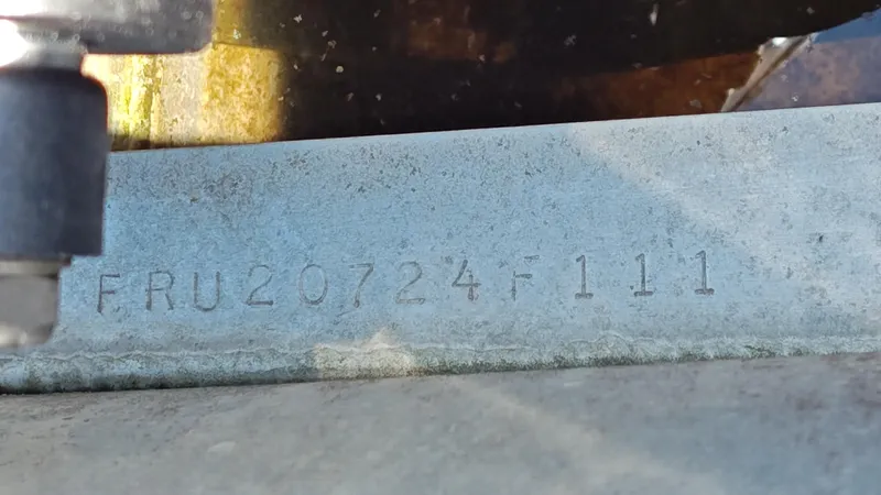 Slide: The Image of Serial number on a 2011 South Bay 722CR boat hull. - 15