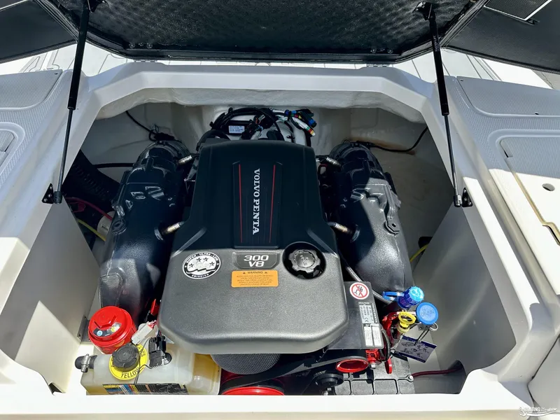 Slide: The Image of 2022 Chaparral 23 Surf boat engine compartment with Volvo Penta 300 V8 engine. - 26