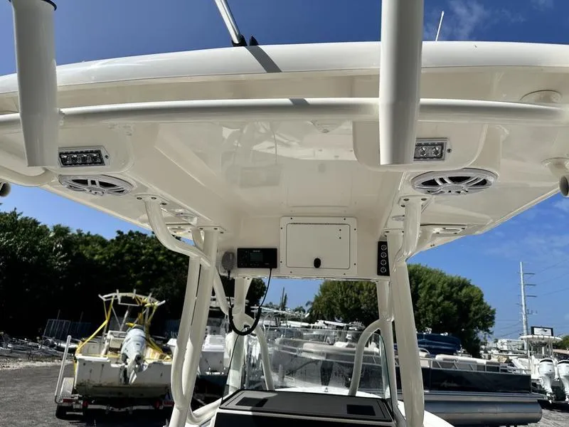 Slide: The Image of 2023 Sea Born FX24 Bay LE boat console with T-top and electronics. - 3