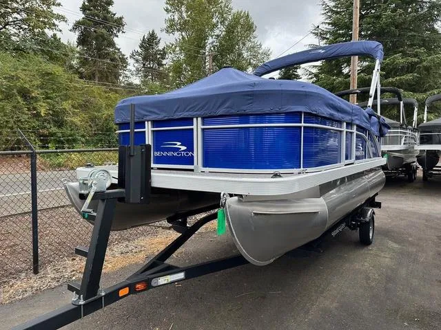 Slide: The Image of 2024 Bennington 188 SVL pontoon boat with interior layout and seating arrangement. - 1