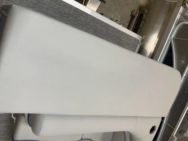 Slide: The Image of 2025 Bennington 188 SVL boat interior with sleek white seating. - 10