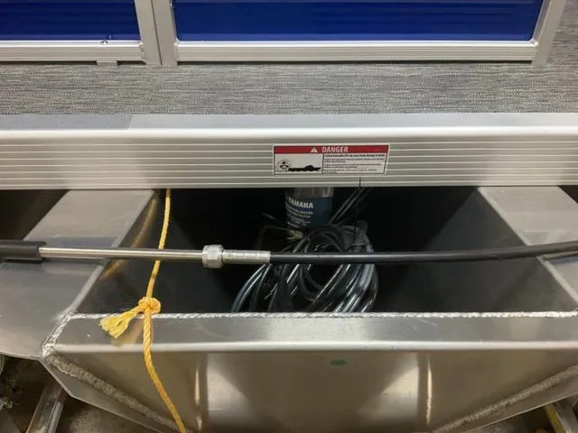 Slide: The Image of Bennington 188 SVL 2025 pontoon boat underdeck view with Yamaha motor cables. - 7