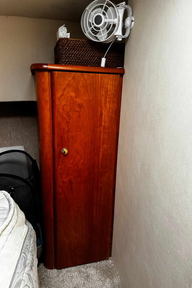 Slide: The Image of Wooden cabinet in 1999 Silverton 392 Motor Yacht interior. - 21