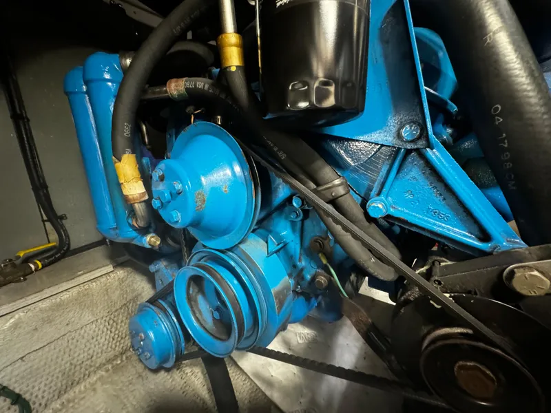 Slide: The Image of Close-up of the engine in a 1999 Silverton 392 Motor Yacht. - 30