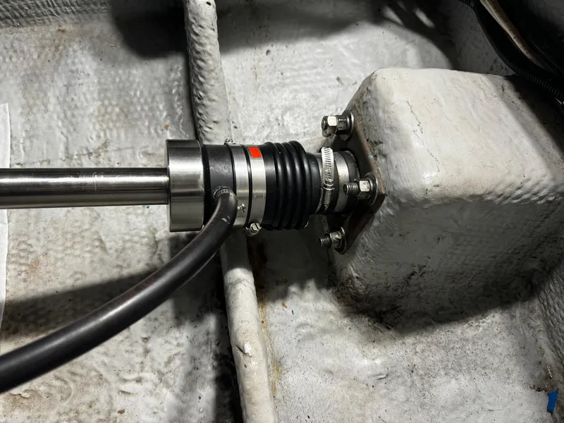 Slide: The Image of Close-up of 1999 Silverton 392 Motor Yacht propeller shaft and coupling. - 37