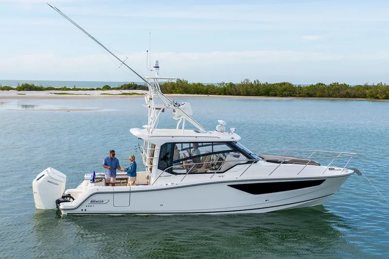 The Image of 2026 Boston Whaler 365 Conquest cruising on ocean, custom order available, base MSRP shown. - 0