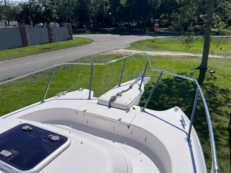 Slide: The Image of 1998 Grady-White F-26 Tigercat boat bow with anchor and railing. - 23