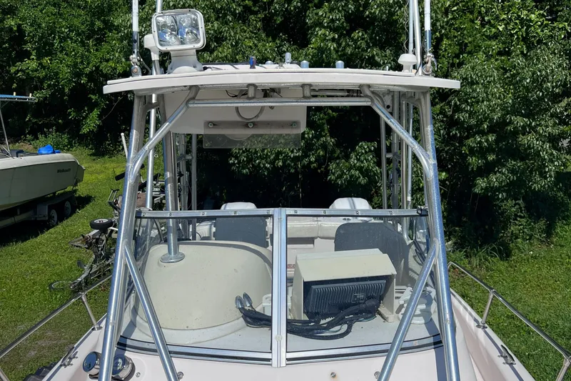 Slide: The Image of 1998 Grady-White F-26 Tigercat boat with T-top and electronics. - 40
