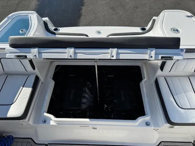 Slide: The Image of 2024 Yamaha Boats 255 FSH Sport H engine compartment, open view, showcasing dual engines. - 25