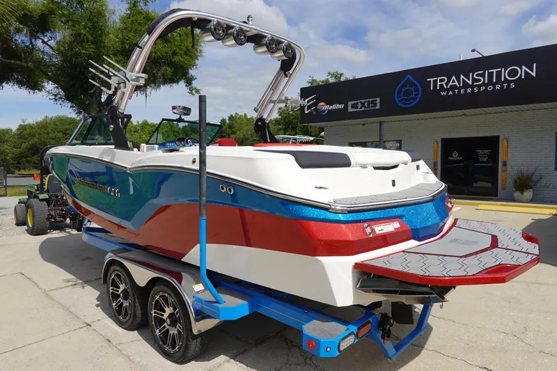Slide: The Image of 2021 MasterCraft NXT22 boat on trailer at Transition Watersports. - 10