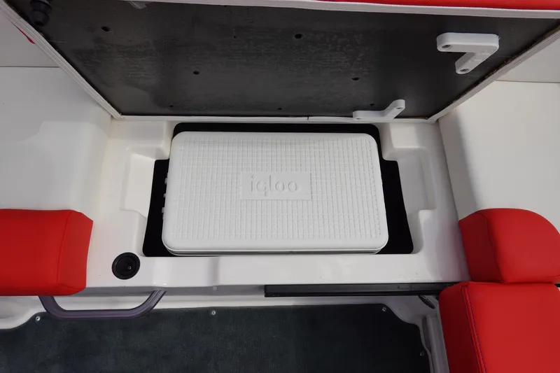 Slide: The Image of 2021 MasterCraft NXT22 boat with built-in Igloo cooler storage compartment. - 35