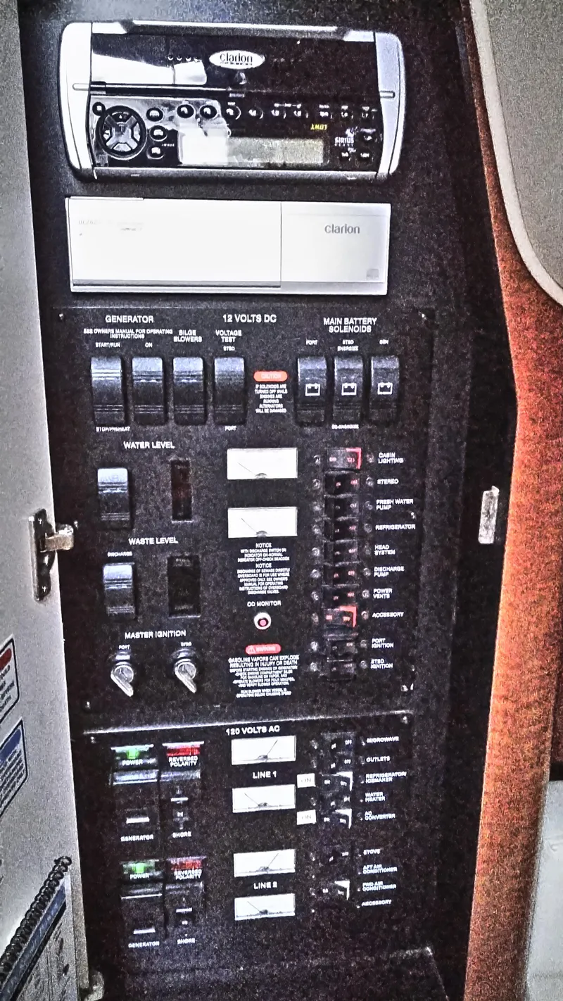 Slide: The Image of Electrical control panel of a 2004 Sea Ray 340 Sundancer boat. - 17