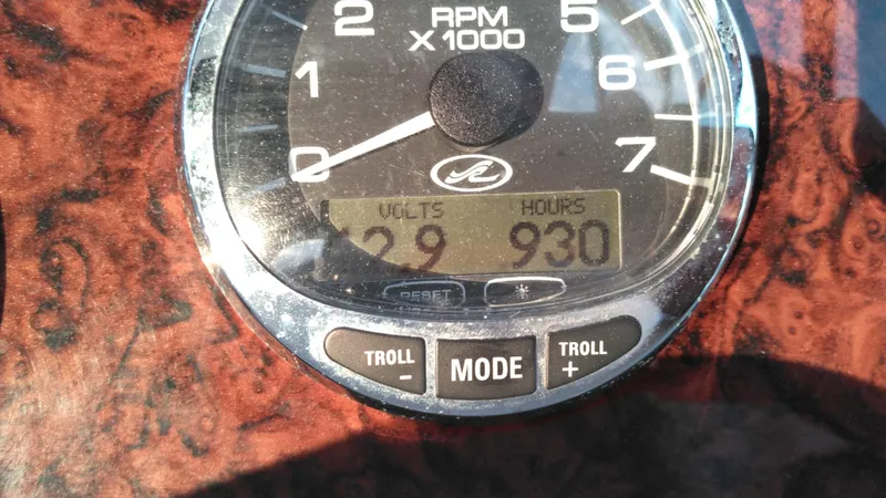 Slide: The Image of Close-up of 2004 Sea Ray 340 Sundancer RPM gauge showing 930 hours. - 19
