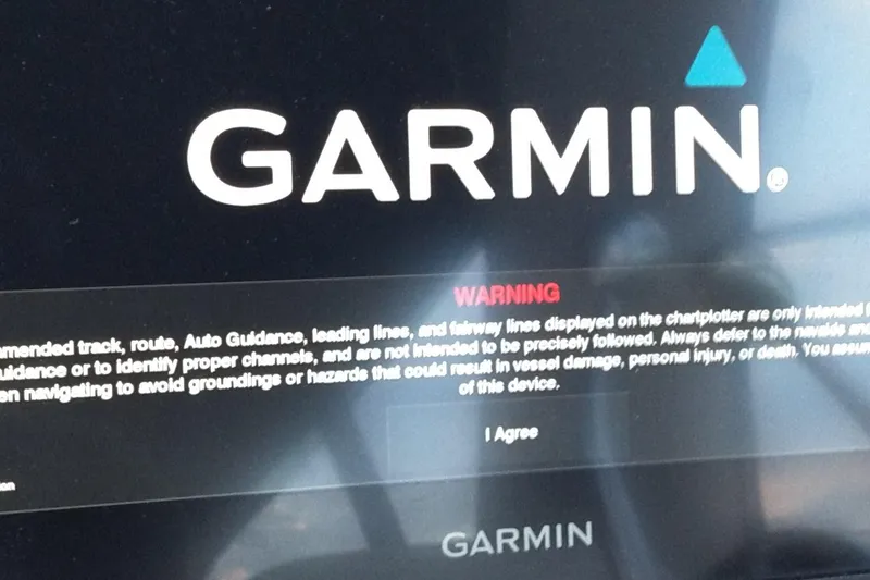 Slide: The Image of Garmin navigation screen on a 2004 Sea Ray 340 Sundancer boat. - 33