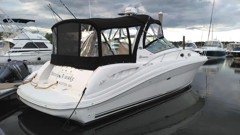 Slide: The Image of 2004 Sea Ray 340 Sundancer yacht docked at marina. - 7