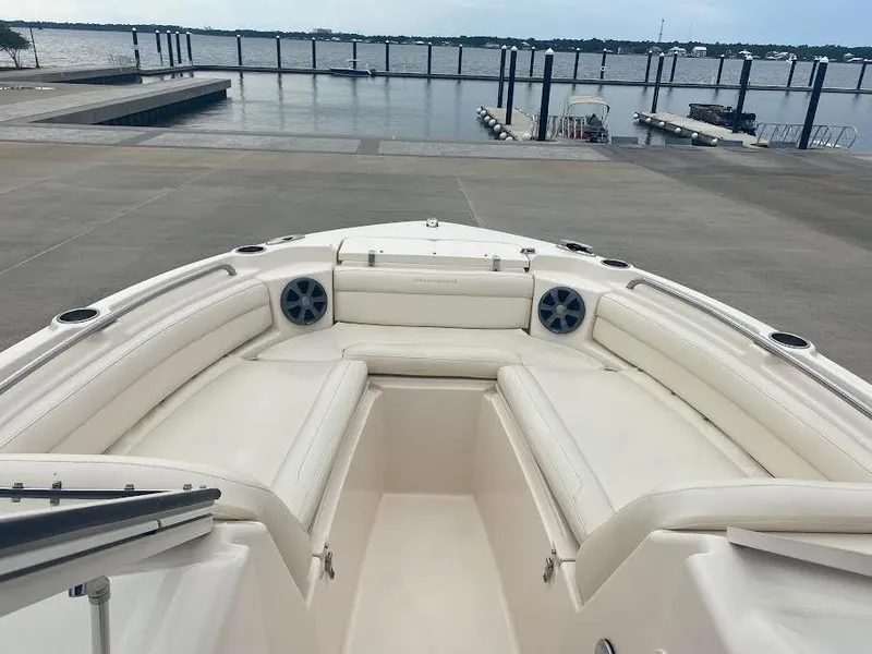 Slide: The Image of 2019 Grady-White Freedom 215 boat interior at dock with waterfront view. - 10