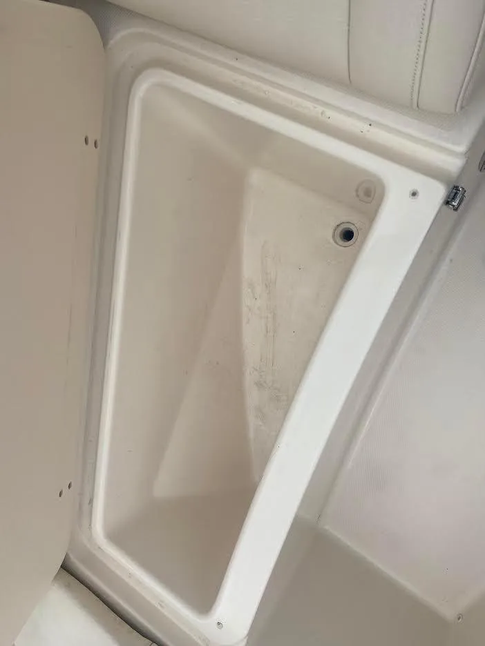 Slide: The Image of Storage compartment of 2019 Grady-White Freedom 215 boat. - 14