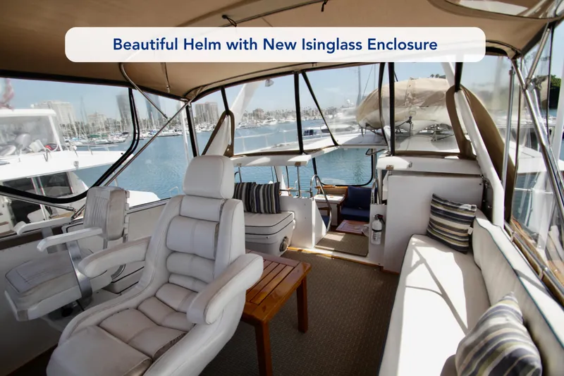 Slide: The Image of Luxurious 1984 Symbol 51 yacht helm with new Isinglass enclosure and plush seating. - 10