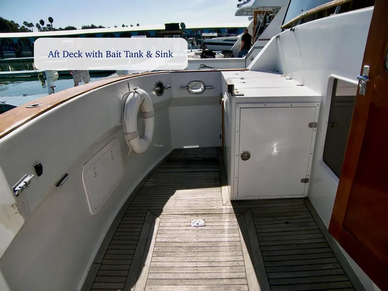 Slide: The Image of Aft deck of 1984 Symbol 51 yacht with bait tank and sink. - 11