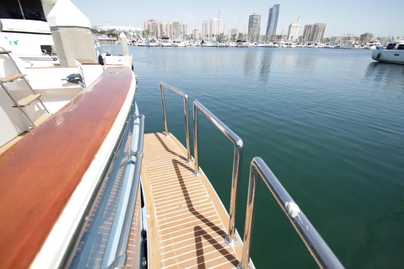 Slide: The Image of Luxury yacht deck with marina view, Symbol 51, 1984 model. - 12