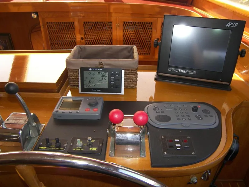 Slide: The Image of Control panel of a 1984 Symbol 51 yacht with navigation and communication equipment. - 18