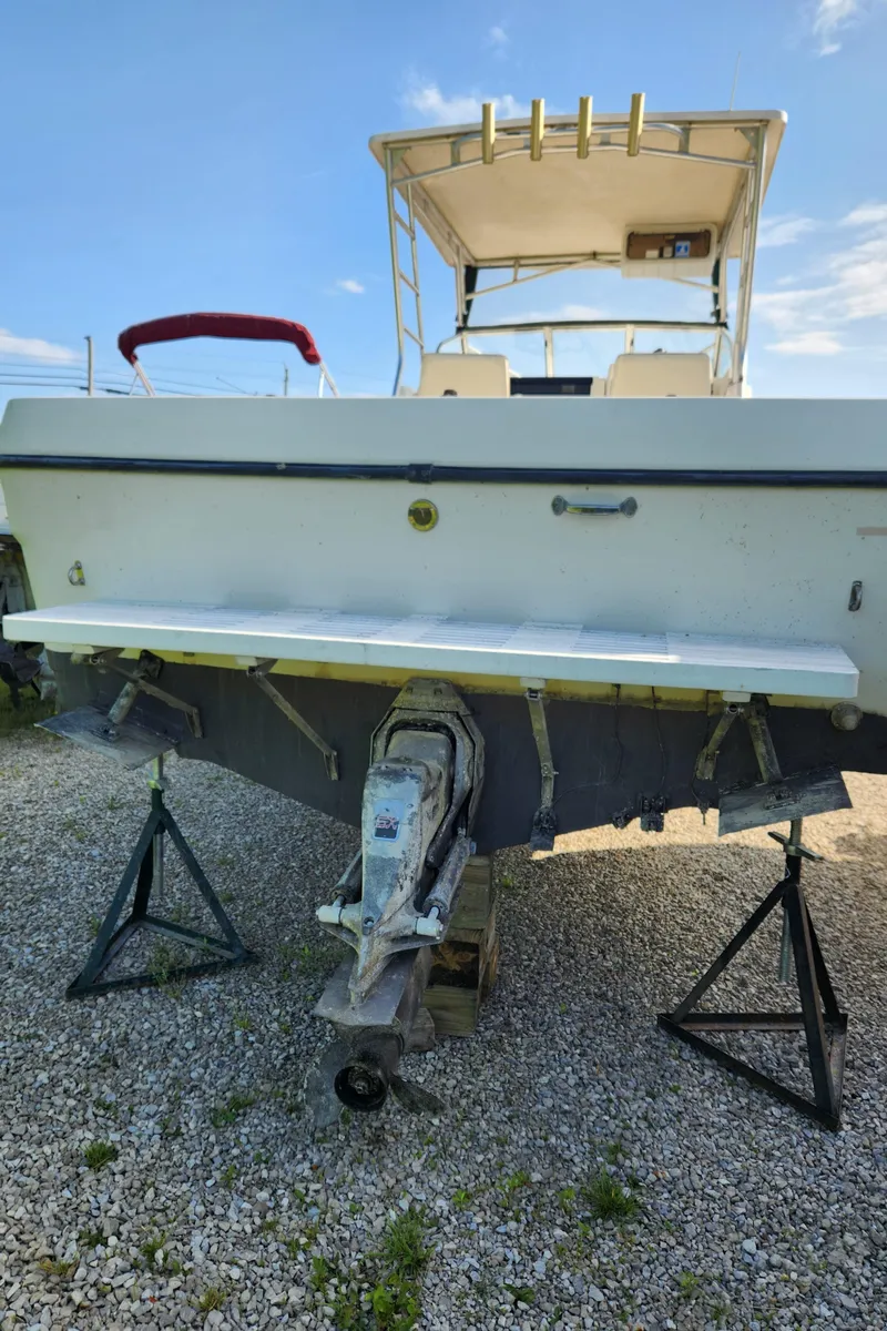 Slide: The Image of 1999 Renken 2788 boat on stands, rear view. - 12