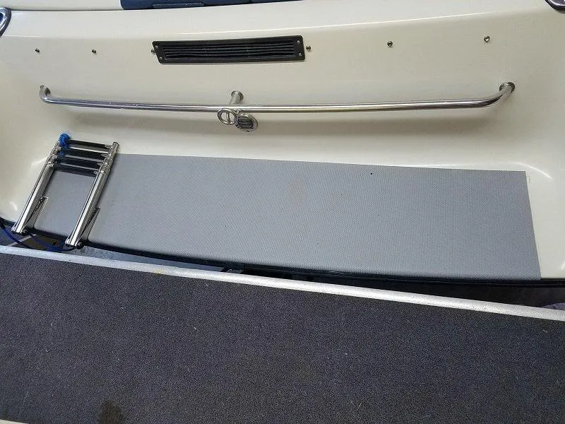 Slide: The Image of 1992 Crownline 210 CCR boat swim platform with ladder and stainless steel rail. - 16