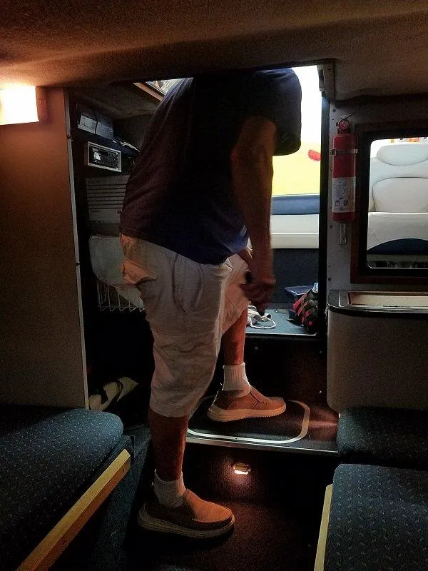 Slide: The Image of Man inside 1992 Crownline 210 CCR boat cabin. - 7