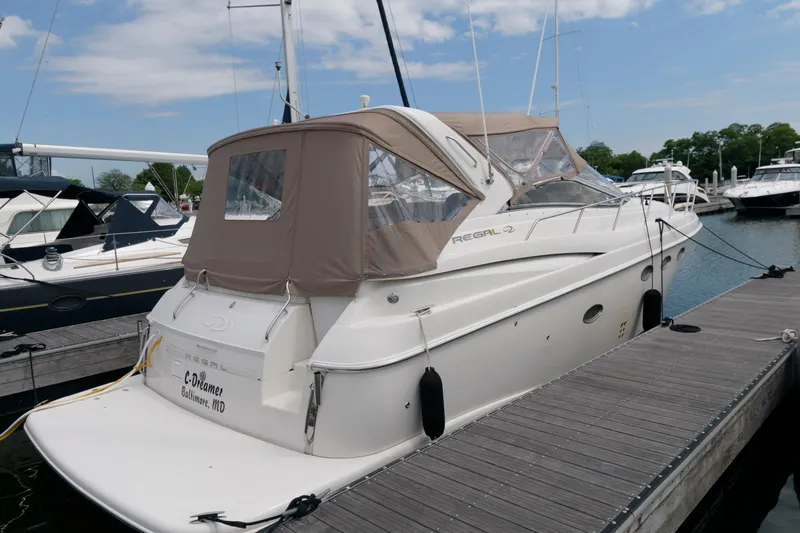 The Image of 2002 Regal Commodore 3860 yacht docked at marina. - 0