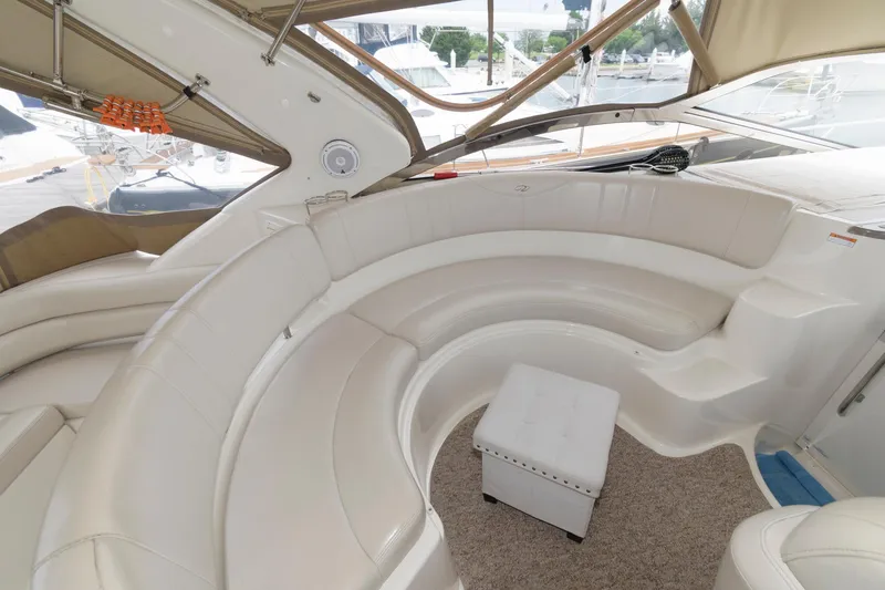 Slide: The Image of Luxurious seating area on a 2002 Regal Commodore 3860 yacht. - 3