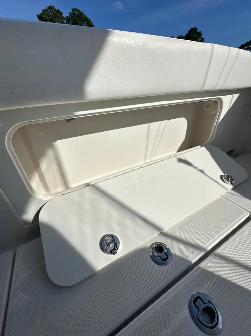 Slide: The Image of 2019 Jupiter 30 HFS boat storage compartment with open hatch. - 26