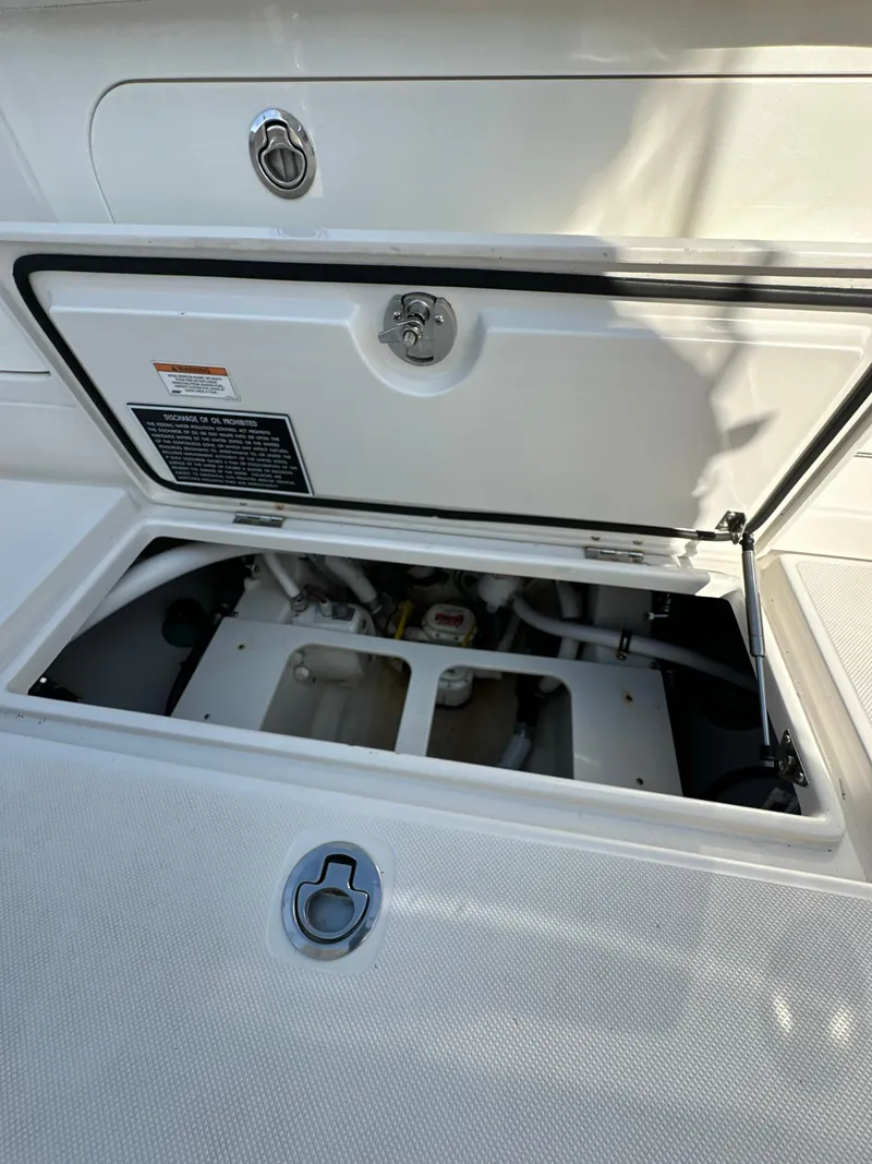 Slide: The Image of Open storage compartment on 2019 Jupiter 30 HFS boat. - 29