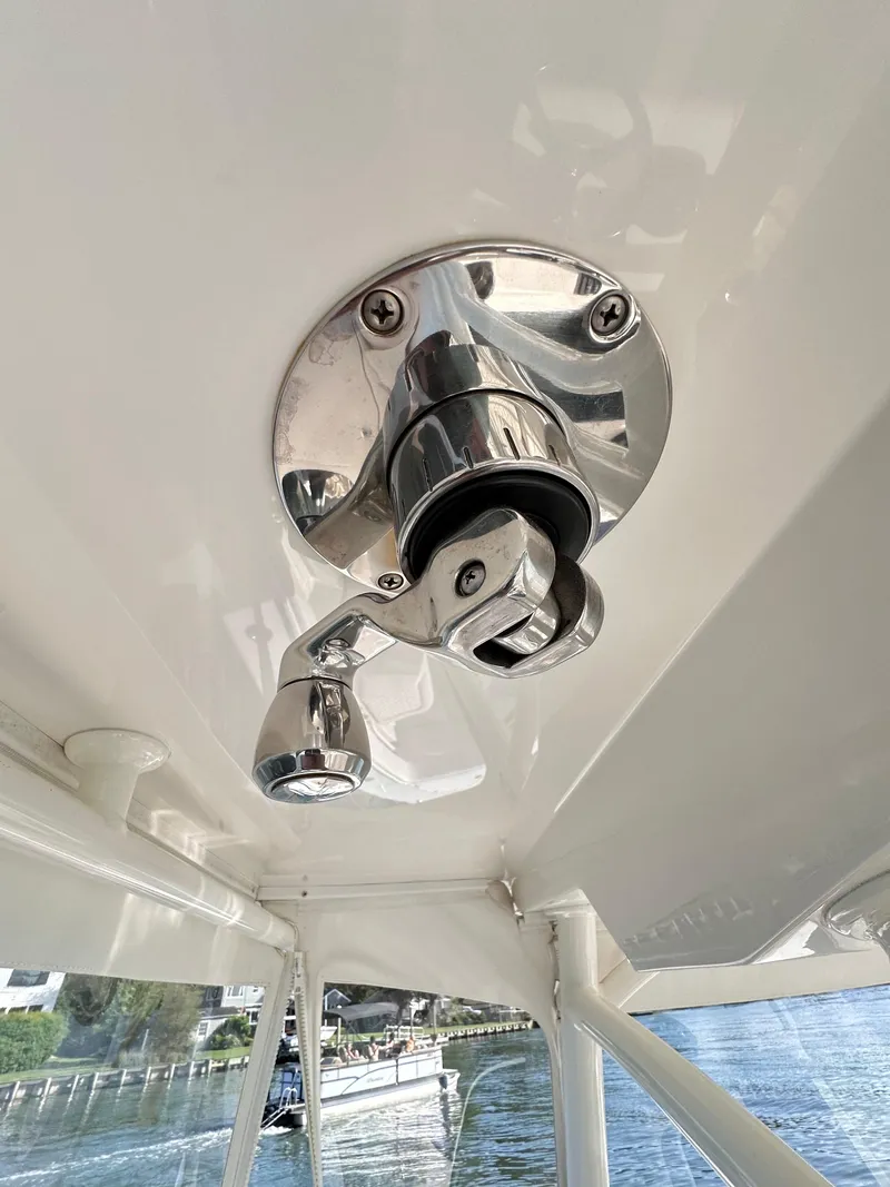 Slide: The Image of 2019 Jupiter 30 HFS boat detail, featuring a polished metal fitting on the ceiling. - 32
