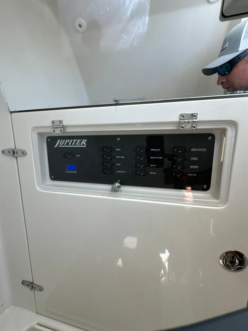 Slide: The Image of Control panel of a 2019 Jupiter 30 HFS boat interior. - 38