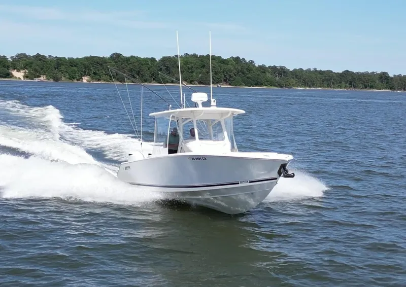 Slide: The Image of 2019 Jupiter 30 HFS boat cruising on open water. - 4