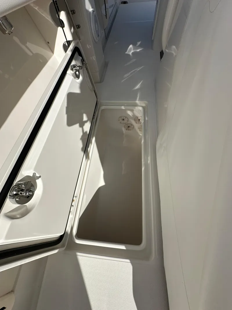 Slide: The Image of 2019 Jupiter 30 HFS boat storage compartment with open hatch. - 41